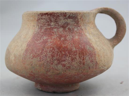 A Greek terracotta cup, c.2nd century BC, 8cm, repaired